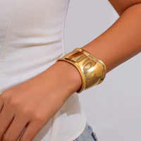 Wide gold bracelet